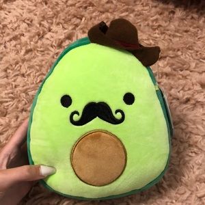 avocado squishmallow with mustache